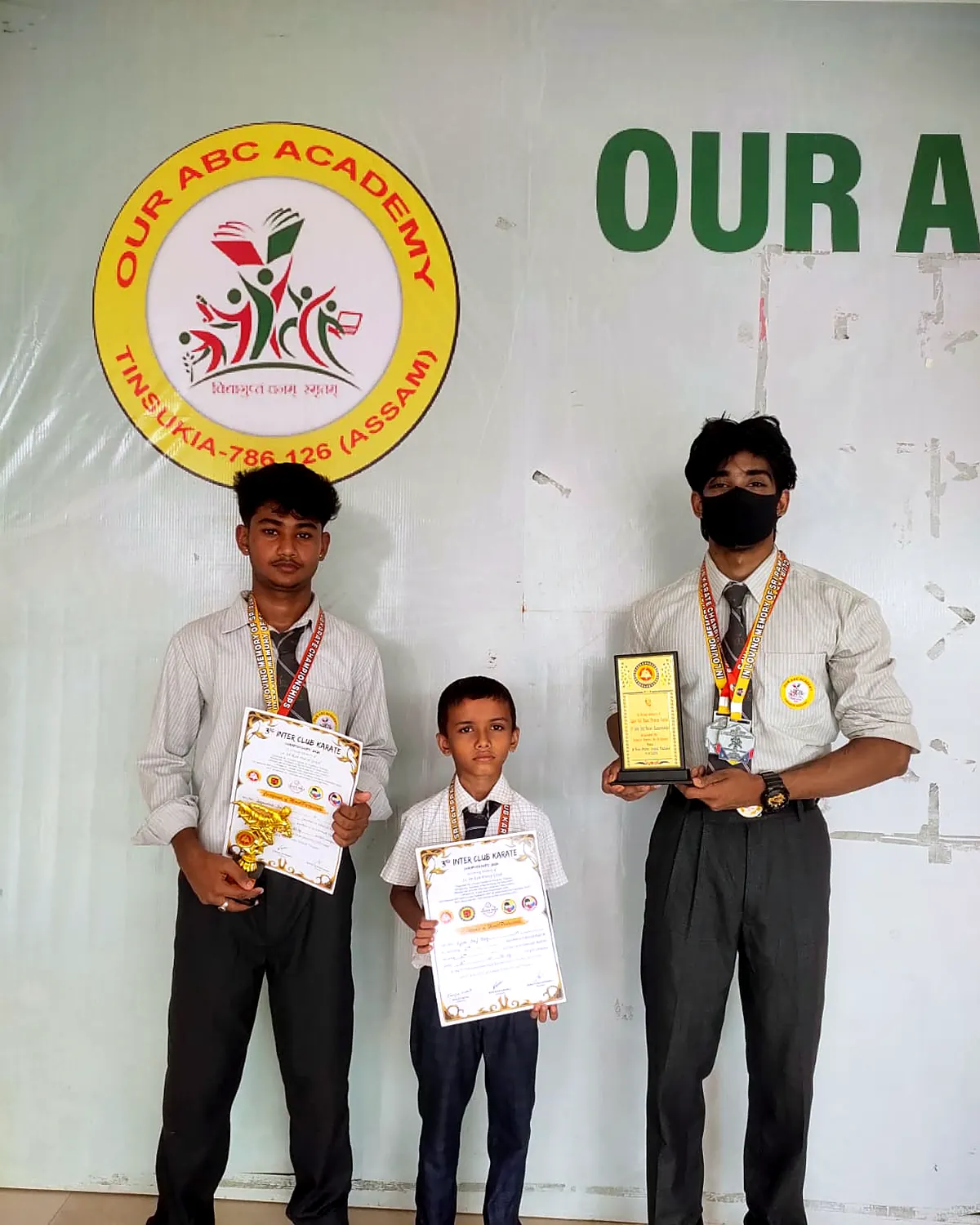Award winners with their certificates