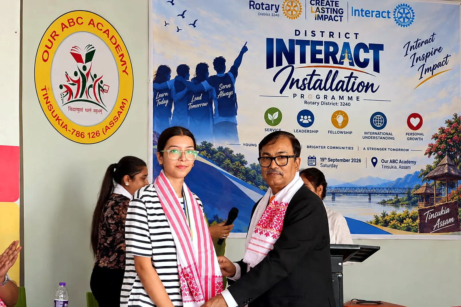 Installation of District Interact Representative Itr Swagata Upadhyaya by District Governor Rtn Dr Ashim Kanti Adhikary
