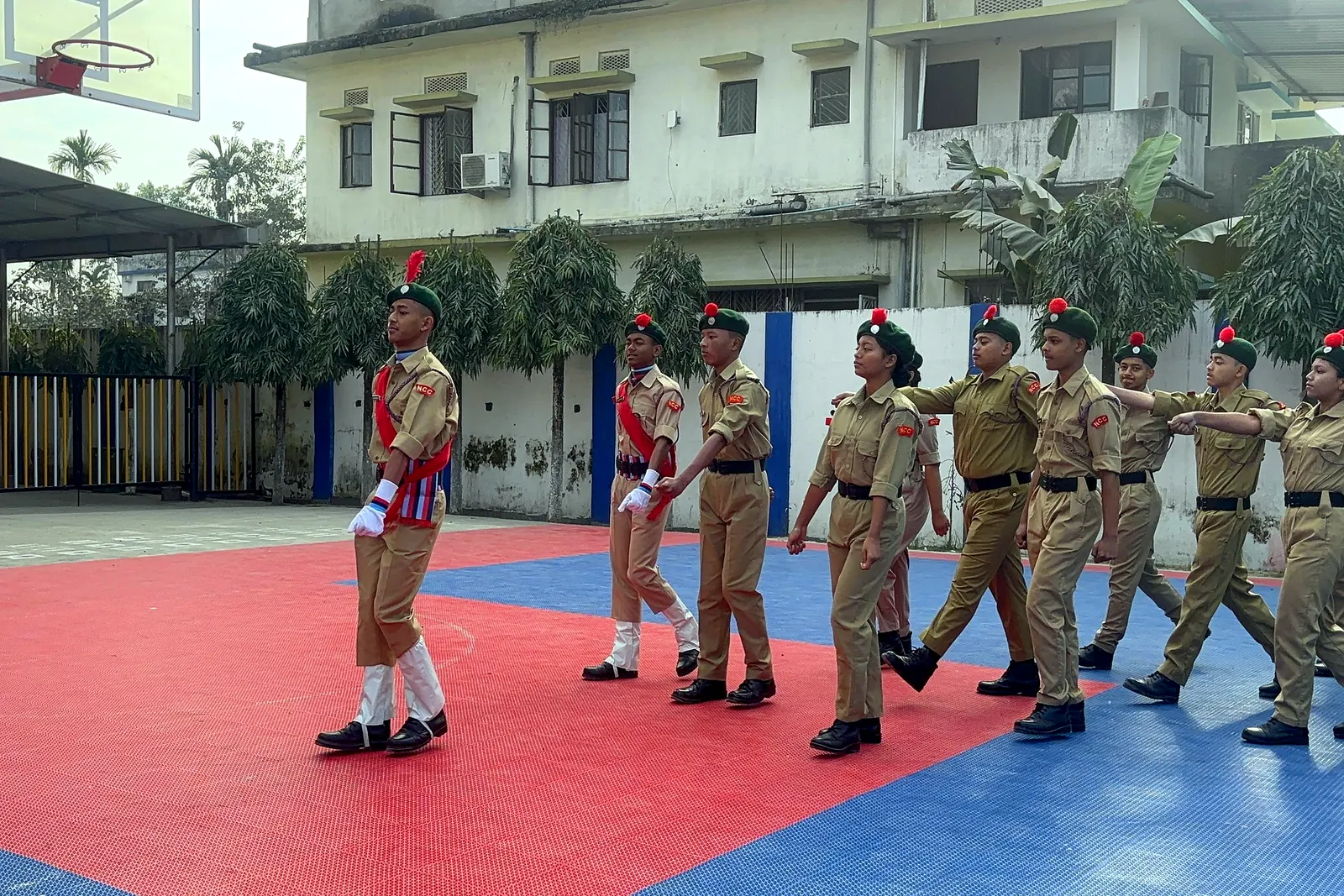 The parade commander leads the salute