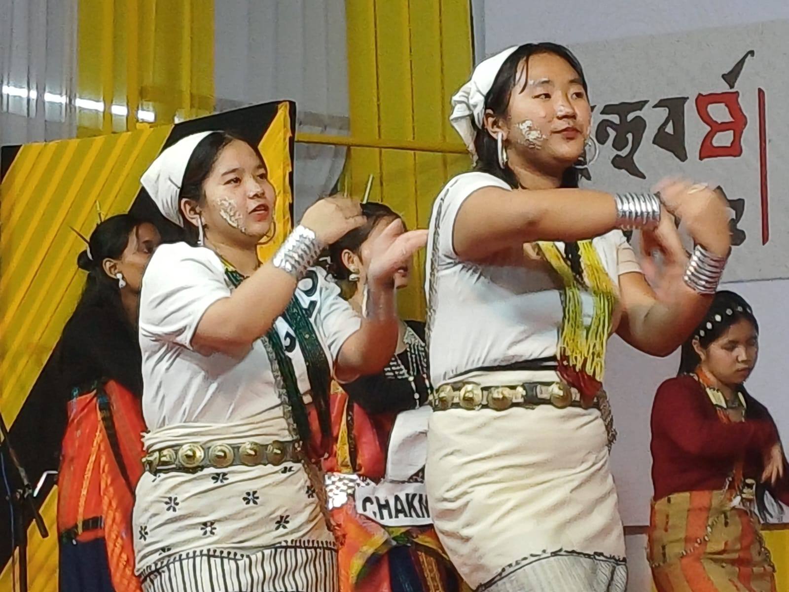 Students in Chakma traditional dress, dancing