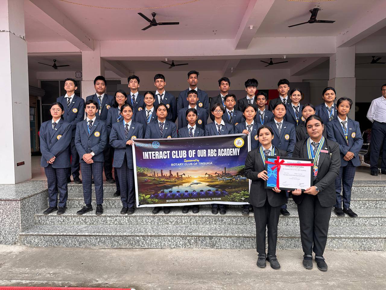 The Interact Club of Our ABC Academy with the Rotary banner
