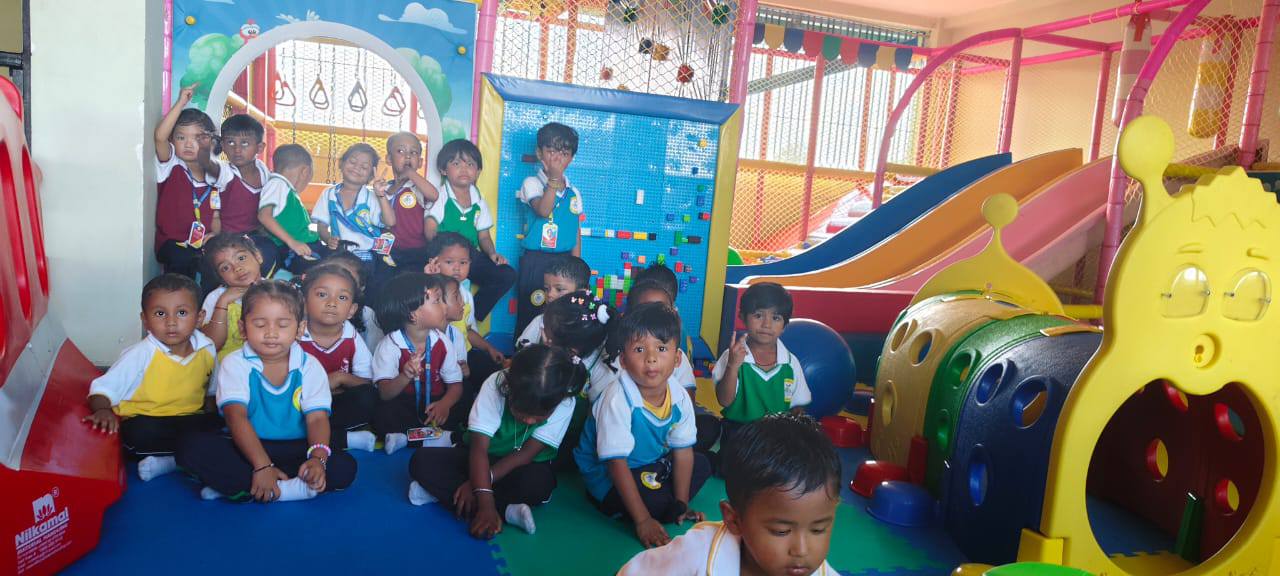 Nursery children at the indoor play area