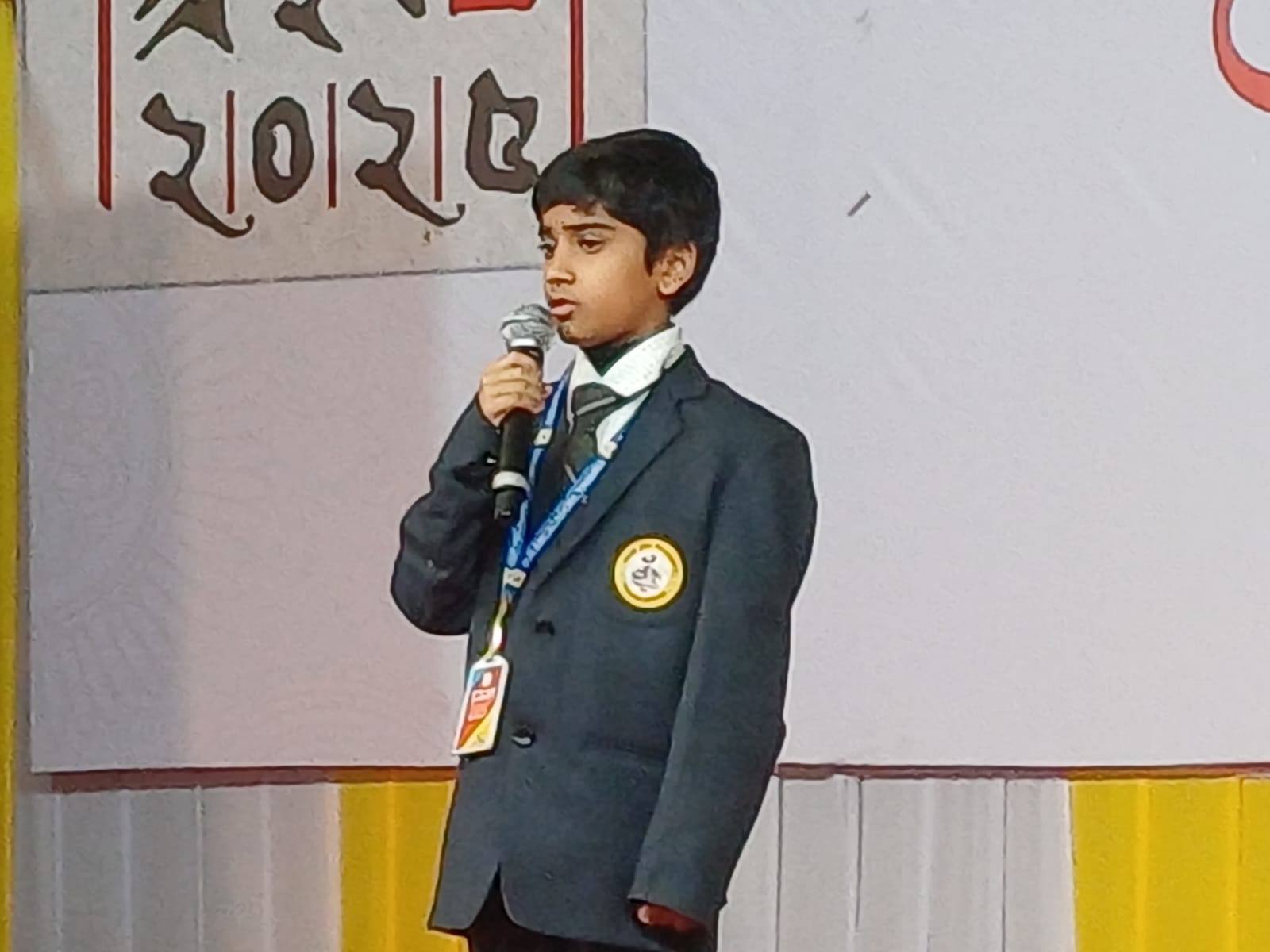 Student delivering speech at the cultural function